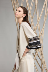 Tricot Chic: Embellished Sleeve Knit Top